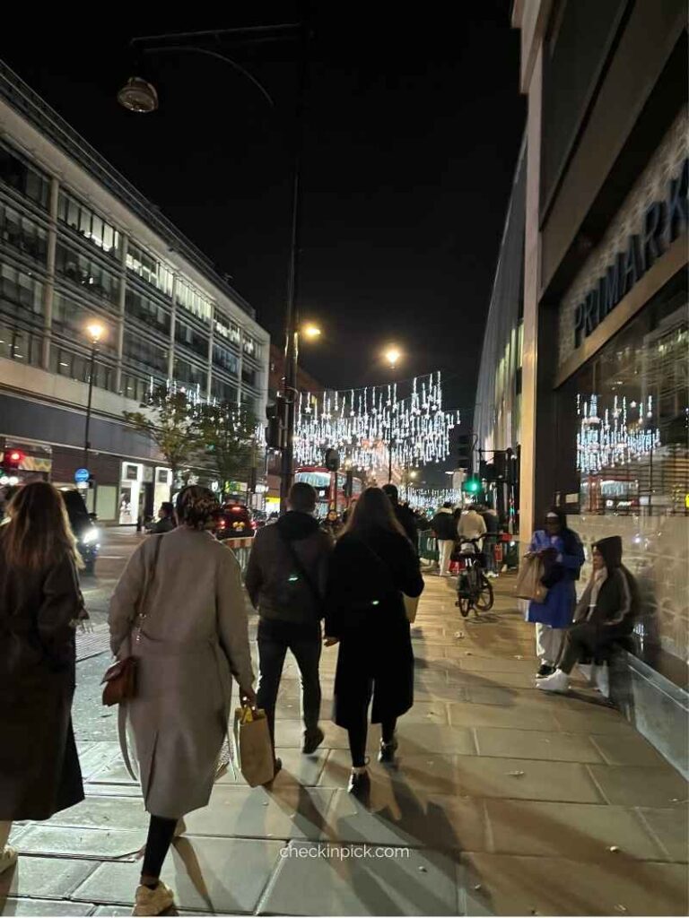 Christmas lights decorating OxfordStreet London