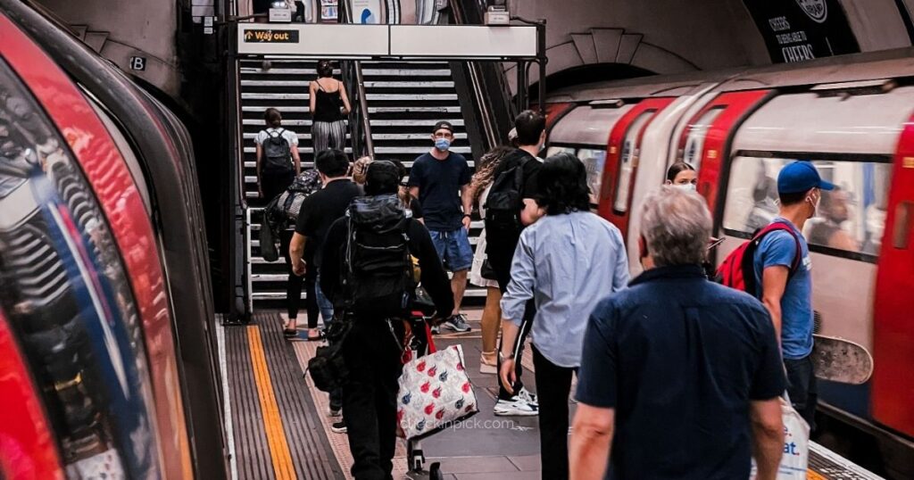 London Underground passengers walking through a Tube station