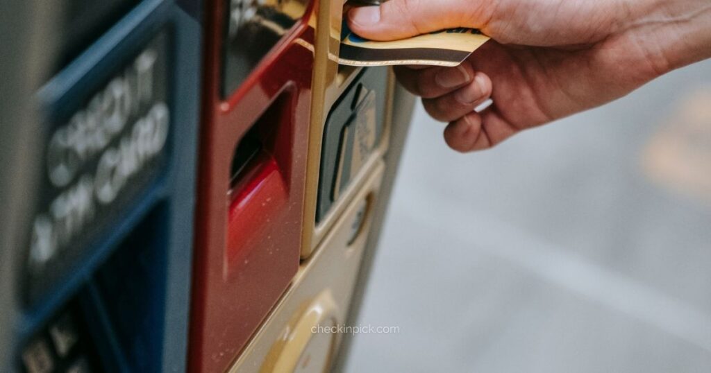 Where to buy an Oyster Card in London showing traveler receiving card from London Underground ticket machine