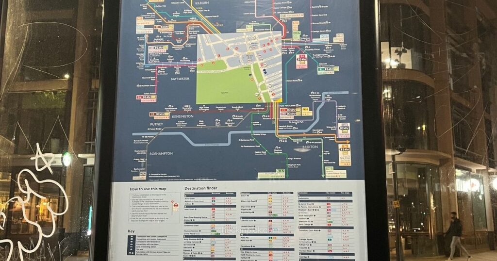 London travel zones explained featuring London bus route map attached to a bus stop shelter