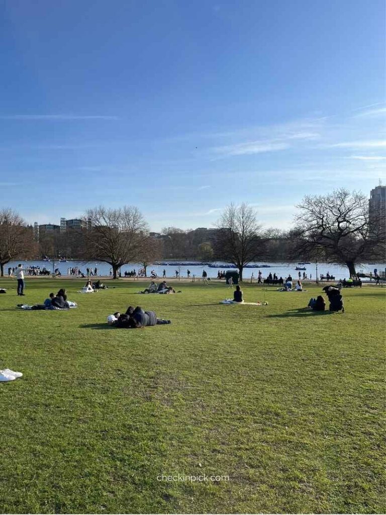 People relaxing in Hyde Park during summer in London