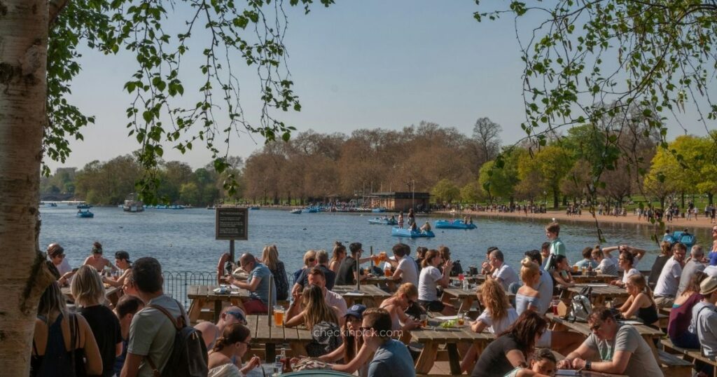 Enjoying a London supermarket meal deal picnic in a beautiful royal park