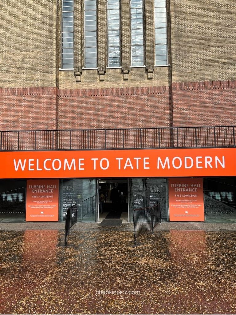 Entrance to Tate Modern with a Welcome to Tate Modern sign in London