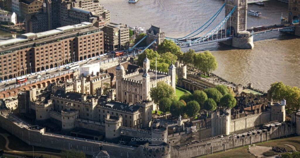 Tower Bridge crossing the River Thames on a clear afternoon.